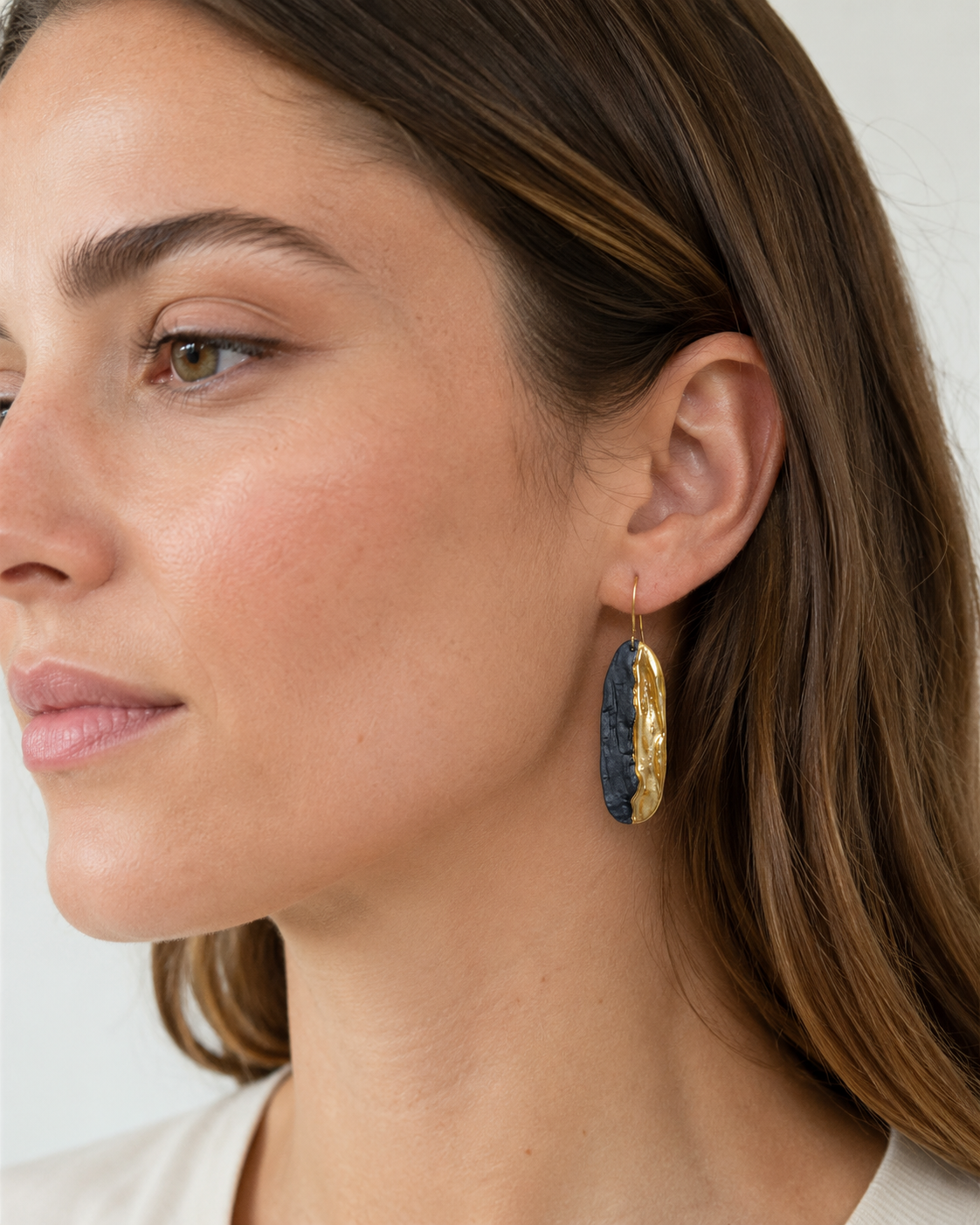Reynisfjara in Golden Light earrings worn by model