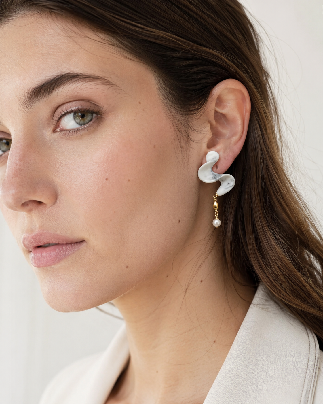 Pearl in Stillness earrings worn by model