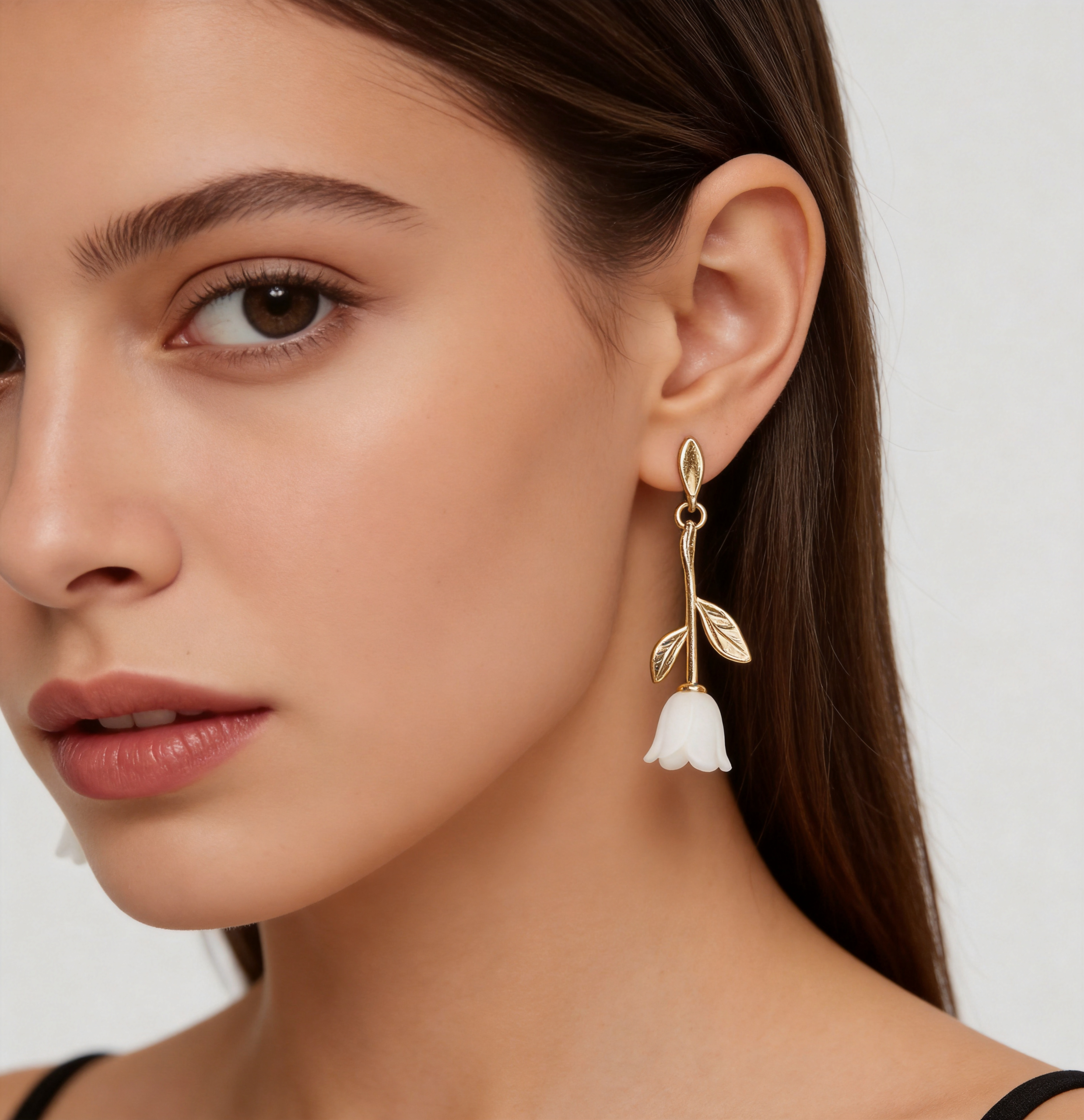 Lily of the Valley earrings worn by model