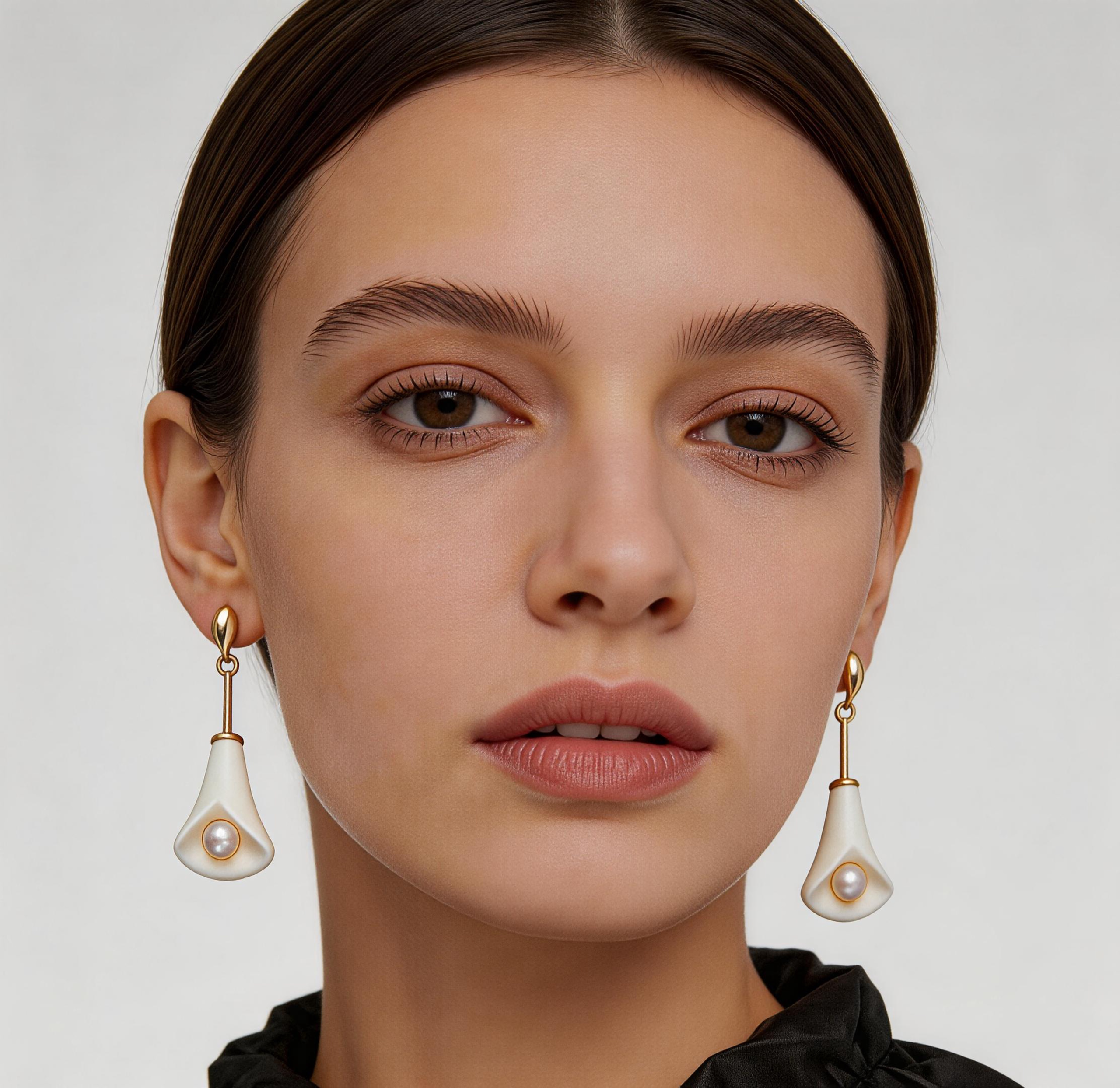 Close editorial crop of LIN floral porcelain earrings worn by model