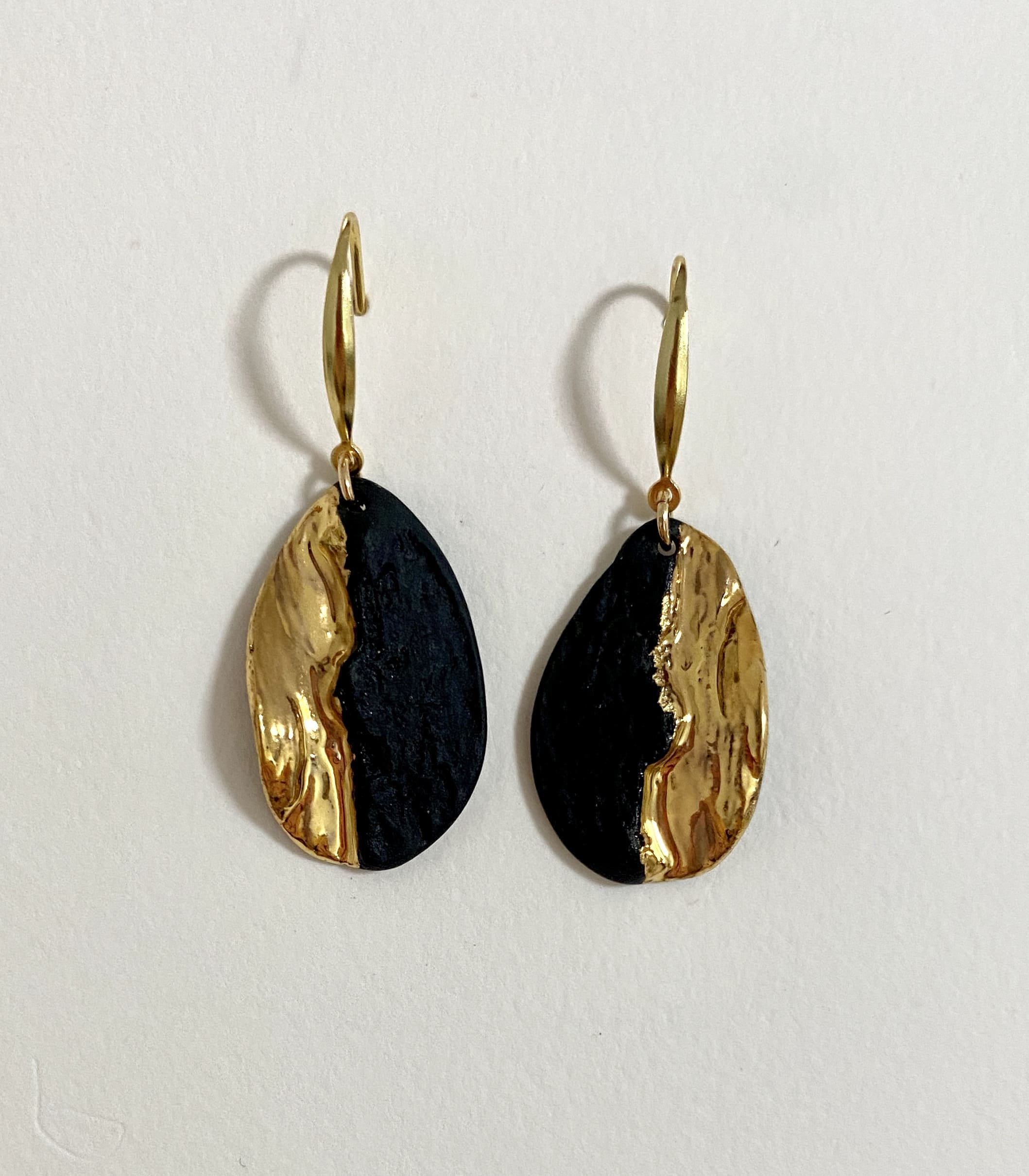 Obsidian Shore high-temperature ceramic earrings with dark coastal contrast
