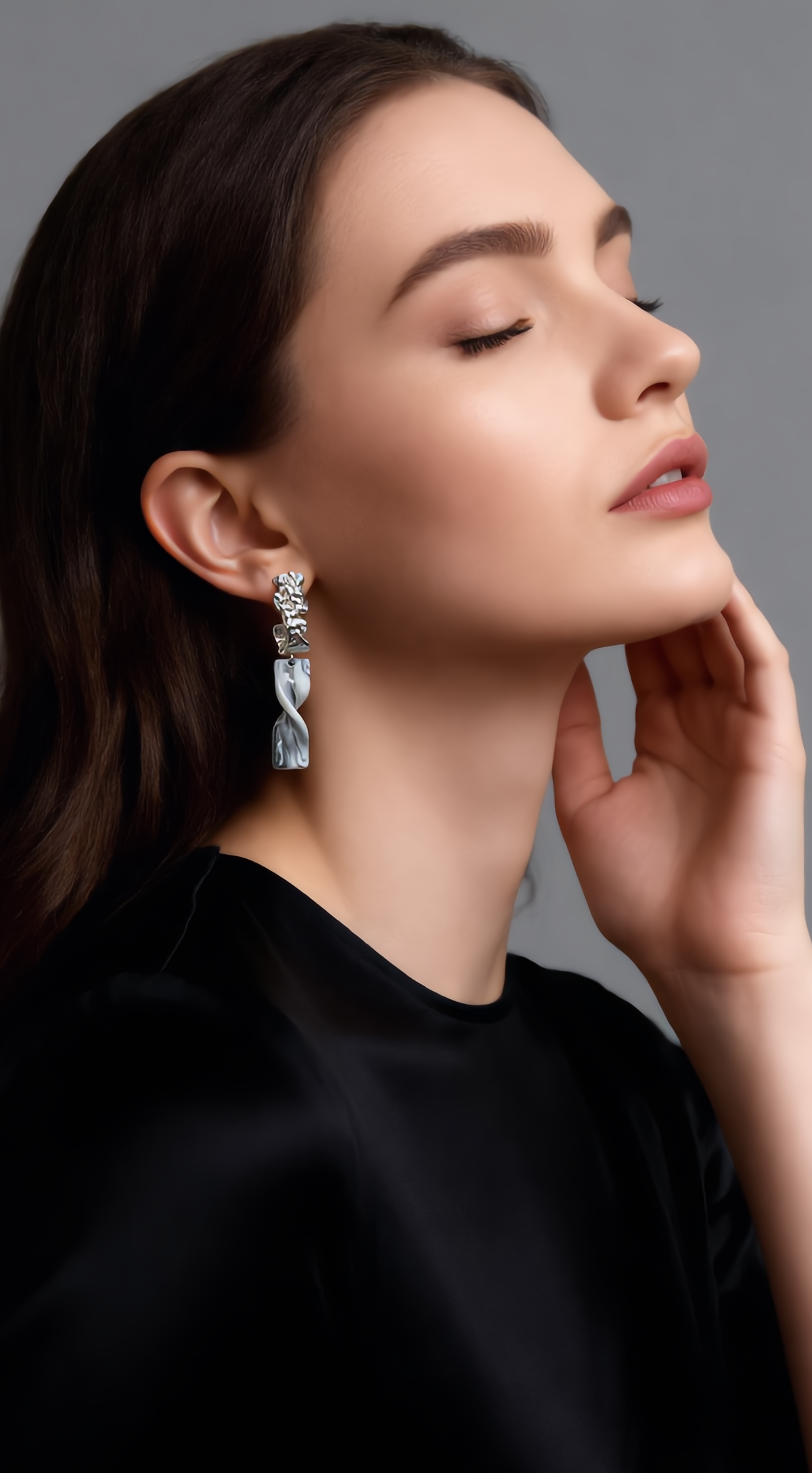 Ivory Balance earrings worn by model
