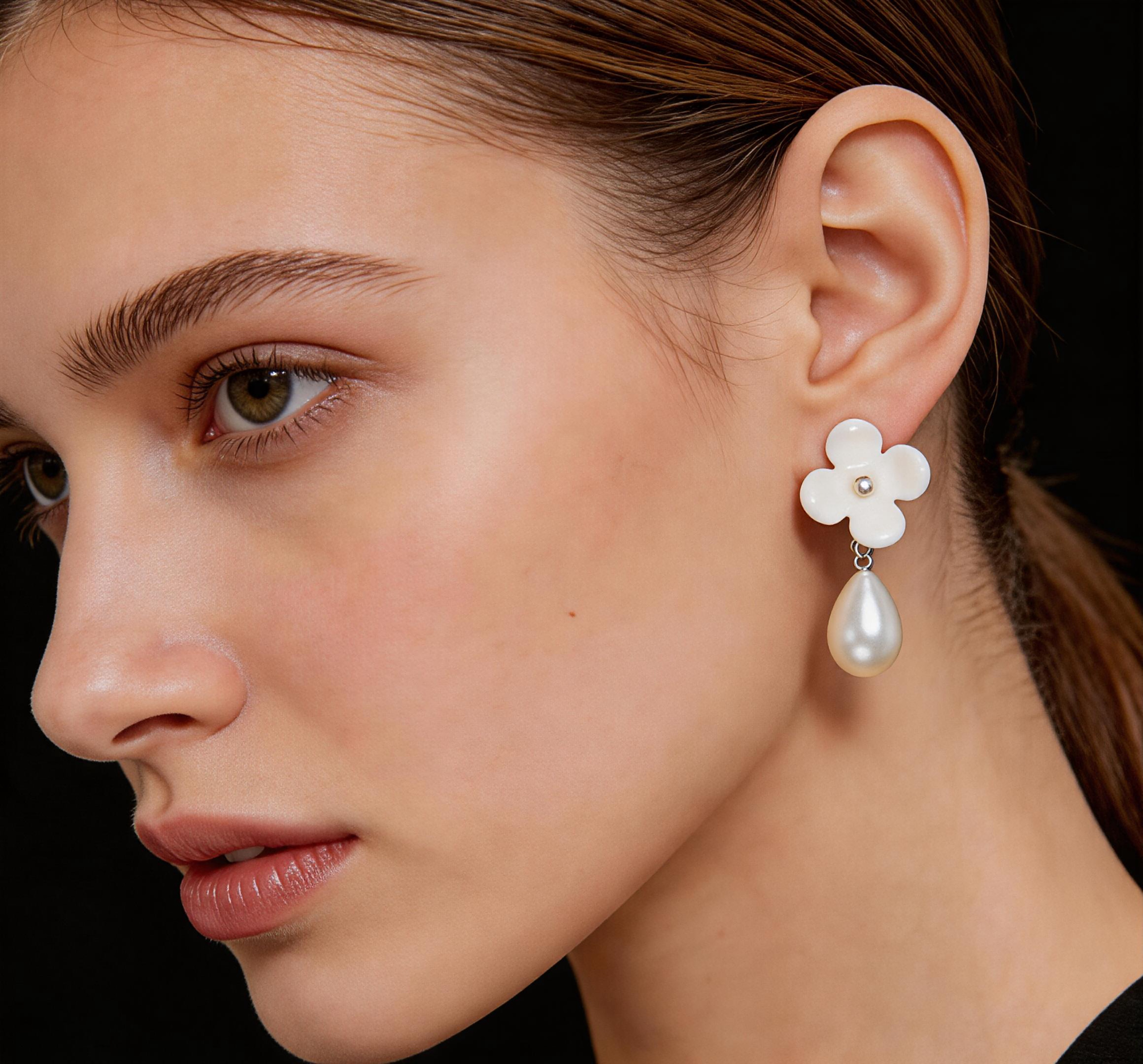 Floral Trace earrings worn by model
